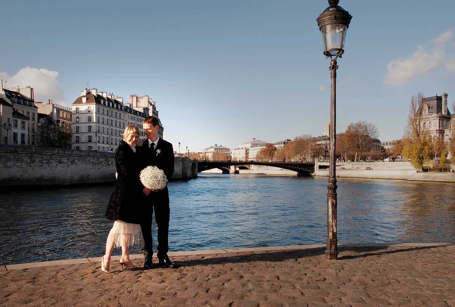 Weddings in and Around Paris 37 Bride and groom on Seine side, Paris, France