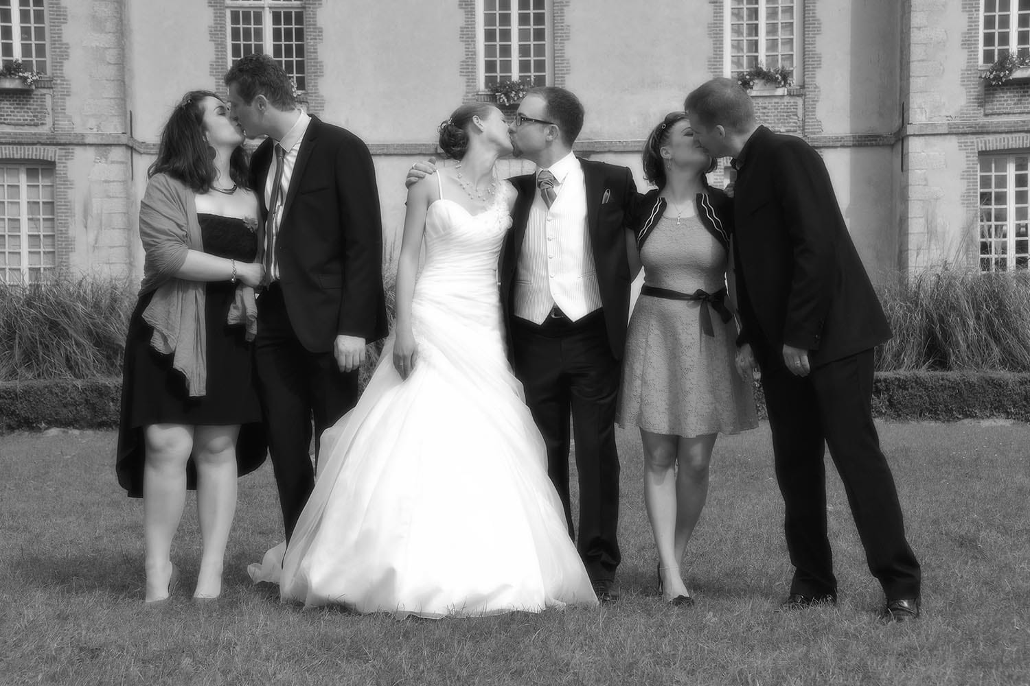 Weddings in and Around Paris 69 Three couples kissing each other at wedding