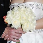 Testimonials Illustration of bride and groom holding wedding bouquet
