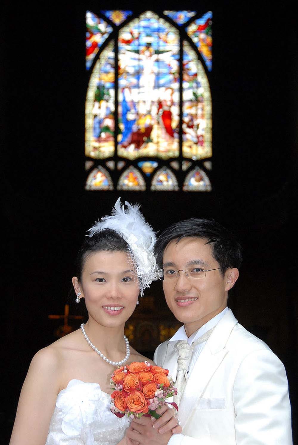 Weddings in and Around Paris 35 Married couple from Hong Kong at church, Paris, France
