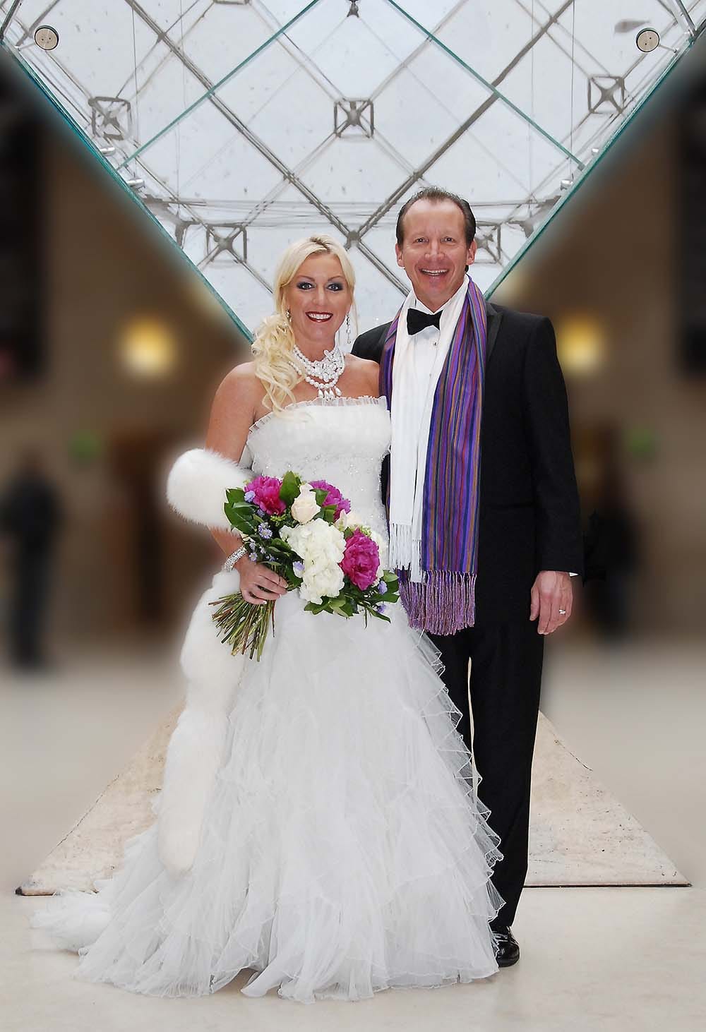 Weddings in and Around Paris 33 Married couple under the Louvre Carrousel, Paris, France