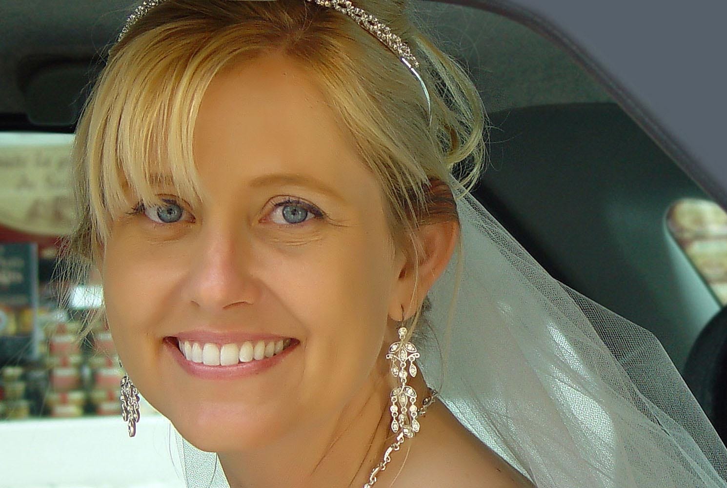 Weddings in and Around Paris 55 Portrait of bride with diamonds, photographed in car