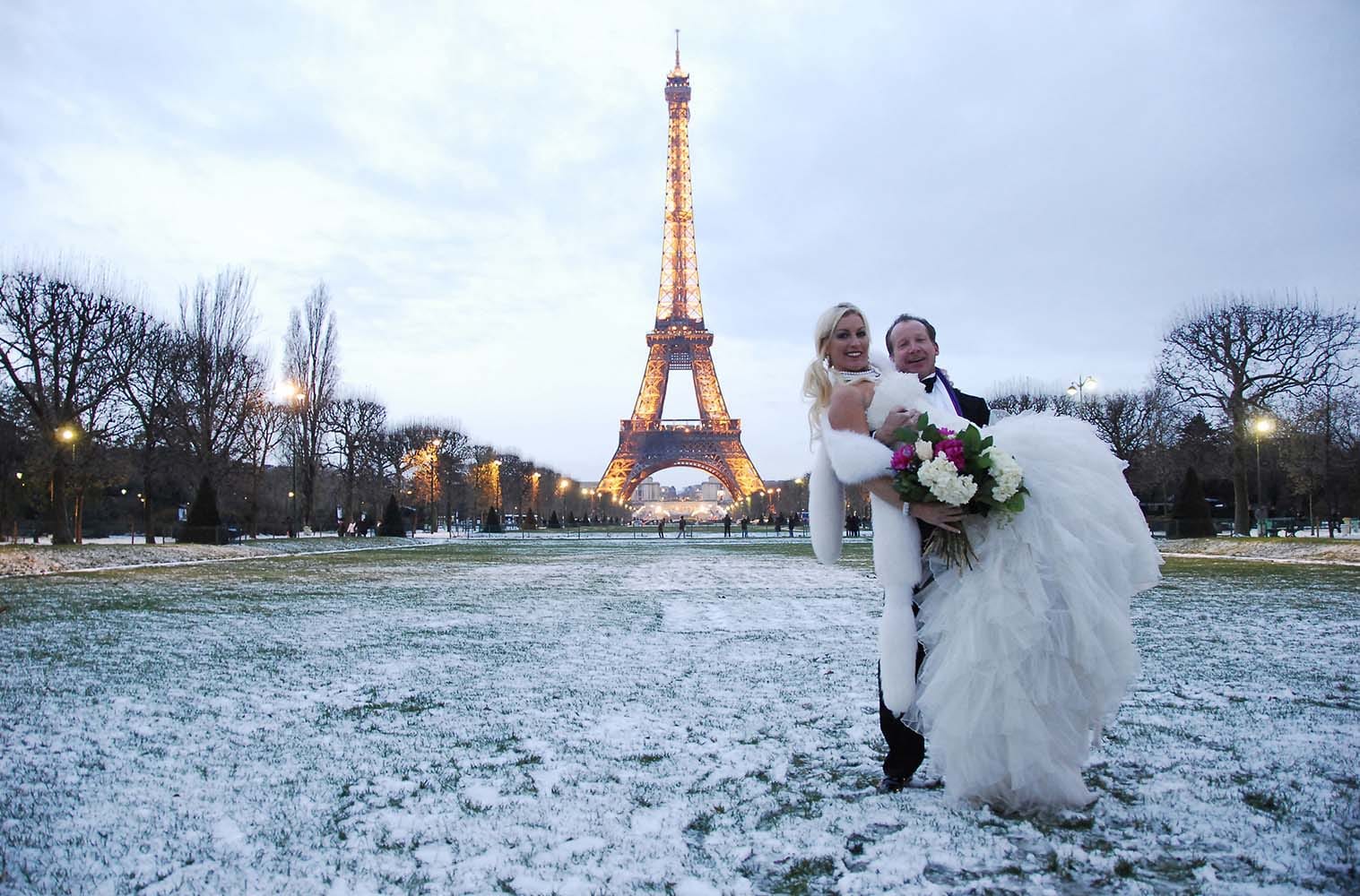 Weddings in and Around Paris 7 Wedding with bride and groom on snowy Eiffel Tower gardens, Paris, France